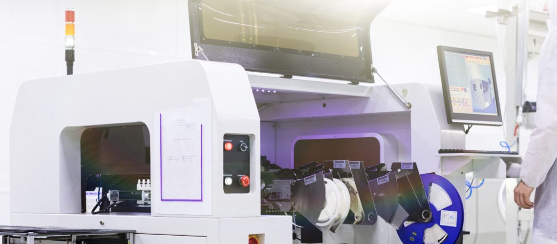 Workshop on assembling telephysics. Testing TVs in the workshop. Electronics assembly line.